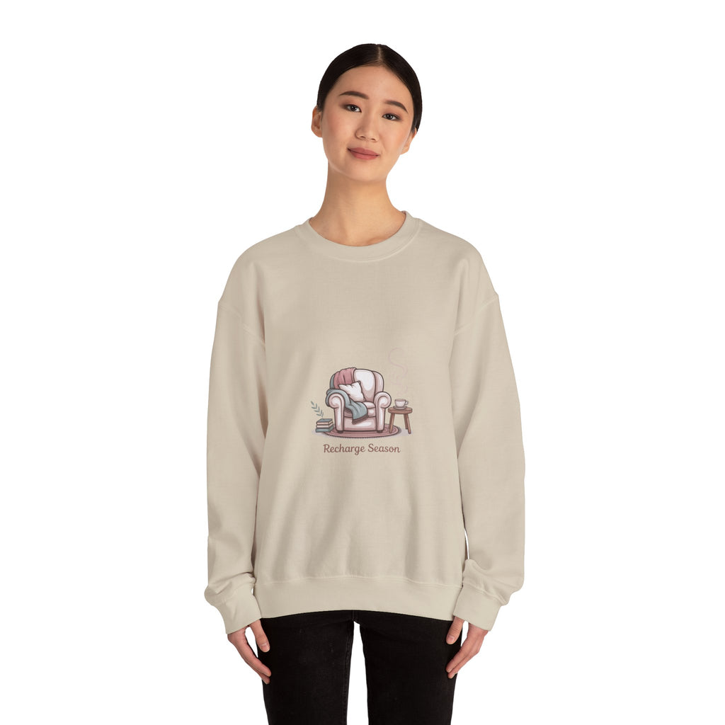 Crewneck Sweatshirt — "Recharge Season" Cozy Armchair Illustration