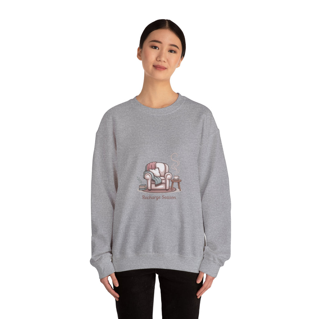 Crewneck Sweatshirt — "Recharge Season" Cozy Armchair Illustration